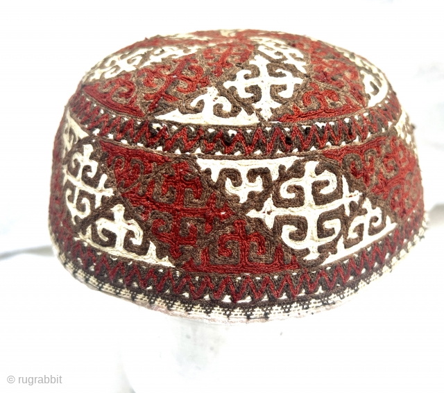 An exceptional and rare antique silk and cotton embroidered Turkmen Yomud  hat. There is a distinctive beauty to a good Turkoman embroidery that is unlike that of their neighboring group, the  ...