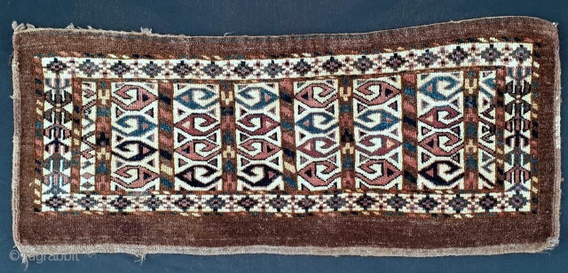 Rare and distinctive Turkmen Chodor torba dated 1877, with wonderful natural dyes and rare design elements, including an ivory field and ram horn trees, Measures 38x92 cm (ca. 15x36 inches). Priced to  ...