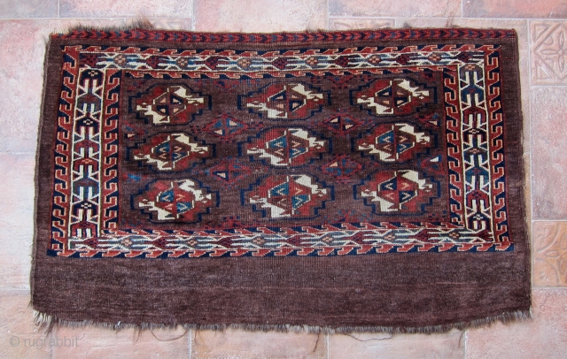 Antique 19th century Turkoman Yomud group, probably Igdyr, chuval. Overall good condition with some slight losses to edges. Size is 44.5x26.5 inches (113x67 cm).         