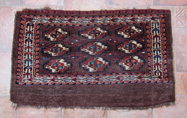 Antique 19th century Turkoman Yomud group, probably Igdyr, chuval. Overall good condition with some slight losses to edges. Size is 44.5x26.5 inches (113x67 cm).         