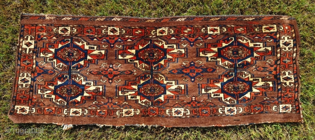 Large antique Turkmen, probably "Eagle Gul Group ii" torba or wedding trapping, with cotton in weft. Great wool quality and all natural dyes. Very good condition with only partially missing side cords  ...