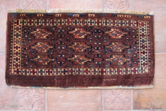 Antique Turkoman Yomud torba with lovely design, wool quality and glowing colors. Size is 84x42 cm.                 