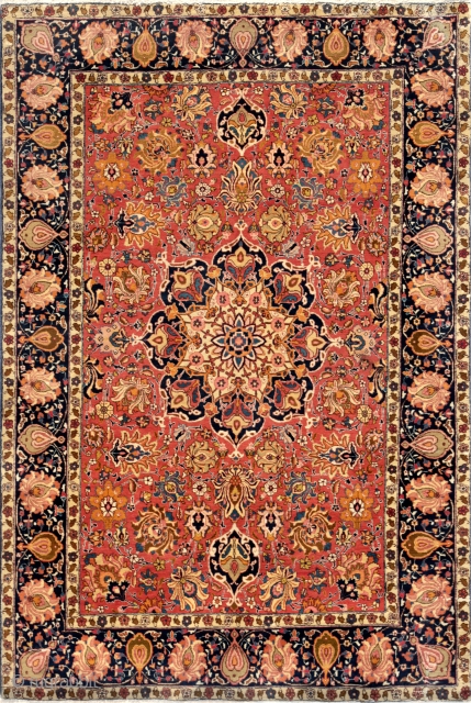 Antique Persian Tabriz woolen rug. Showcasing floral medallion with symmetry and vibrant colors. 197 x 137.                 