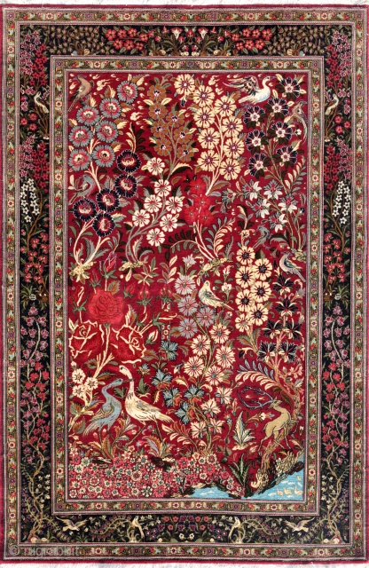 Pictorial Tabriz woolen rug featuring a lively forest with flowers, birds, a lake and an antler. 213 x 142.              