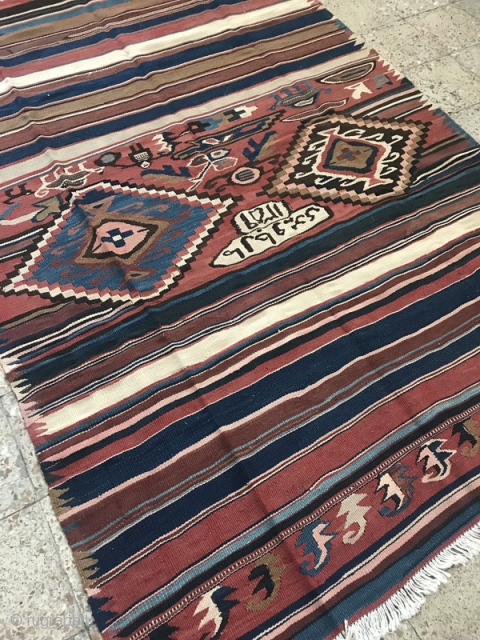 270x185 cm
Azarbaijan kilim in good condition,(dated 1359)                          