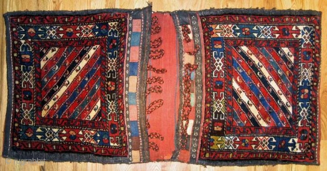 Pair of Veramin saddlebags from North Persia in perfect original condition.The size is 2´.0"x3´.11", great colors, rare design,circa 1890,original backing and soft handle.          