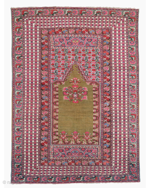 Antique Ghiordes Prayer Rug Circa 1840’s

The rug is beautifully drawn with superb pastel colours through out especially the soft green in the field. The multiple stripe border design is very attractive.

The rug  ...