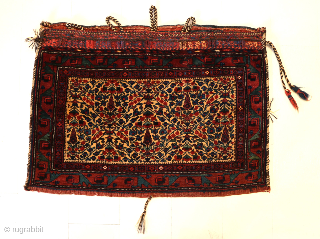 Ca.1910. Afshar Bag. 84 x 60 cm. This bag exhibits the skilled craftsmanship of the Afshar tribe in Persia. The weaving with the embroidered borders, the tassels with Goats hair, the braiding  ...