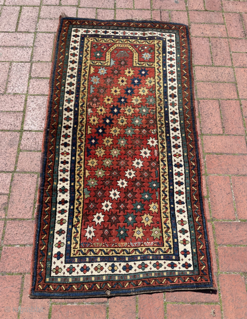 Antique Kasak Metaneh (talish) prayer rug. Natural dyes and untouched condition. Just has couple of moth holes in it. Size 145 x 73 cm. Please contact for more info via direct e-Mail  ...