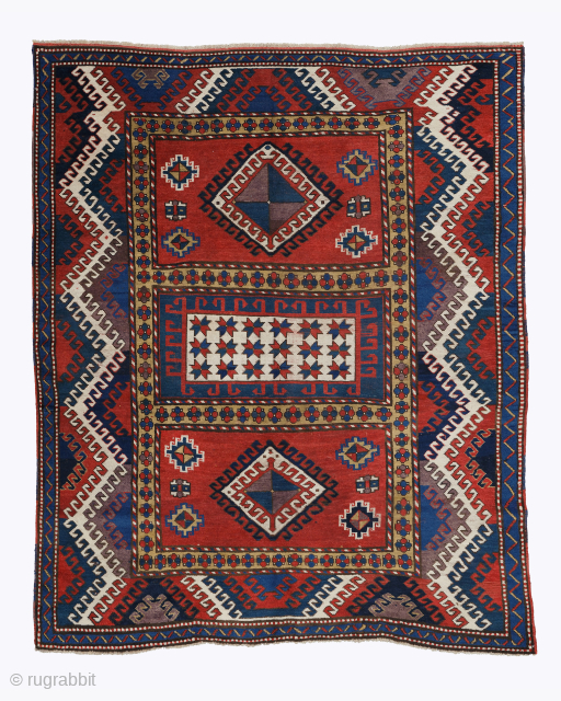 Mid 19th century Bordjaloau Rug 

A three-panel Cossack from the Borjalou group, with the typical wide hooked vine border and yellow-framed three-panel field design. Signs of wear and tear. A yellow frame  ...