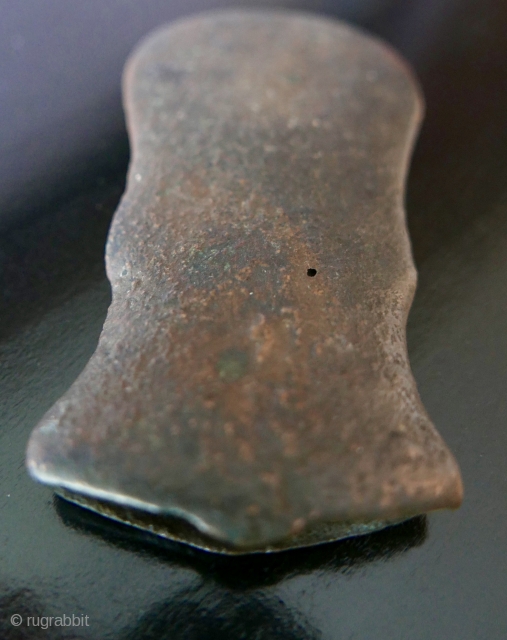 Bronze Age Burmese Battle Axe Head;  approx 3000 years old;  acquired in Rangoon last century;   3 3/4"H x 2"W

No longer available        