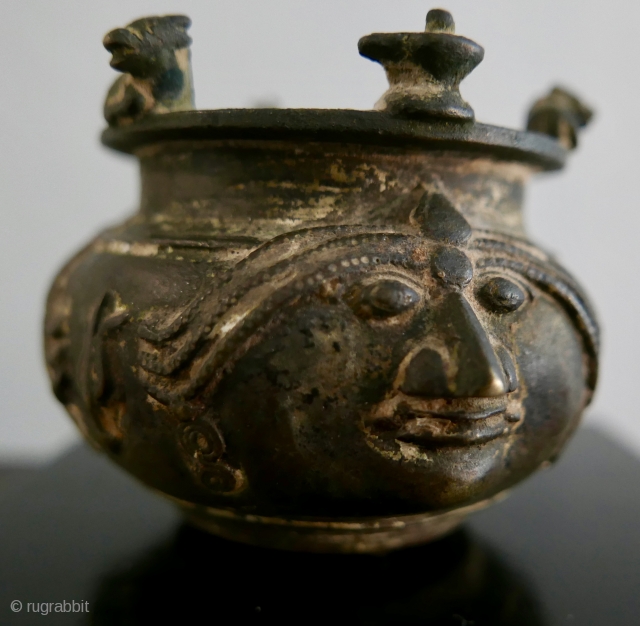 Shaivite Sacred Ash Bowl;  S India;  Brass;  19th c. or older.   Adorned with Shiva's symbols -  the Bull, Nandi, the Llingam, the Trident,  the Sun  ...