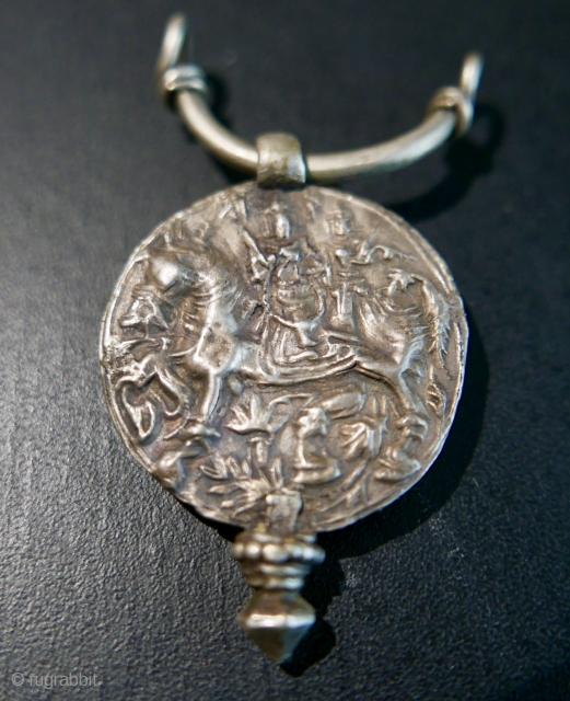Antique silver amulet of Hindu deity astride a horse...possibly Revanta,  a minor deity,  mentioned in the Rig Veda,  as the youngest son of the Sun God,  Surya;   ...