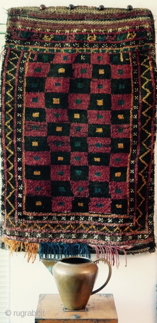 Complete Baluch 'Pushti' with incredible graphics, and plush glistening wool;  circa 1920;  2'x3'/60cm x 90cm;  some moth damage at the very edge  but none where the beauty lies;  ...