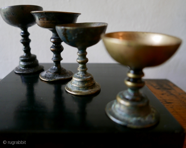 A set of marvelous 19th c Tibetan Buddhist Butter Lamps;  traditionally used in Tibetan Buddhist monasteries and temples in Tibet and elsewhere; an aide to meditation ,  the light 'dispelling  ...