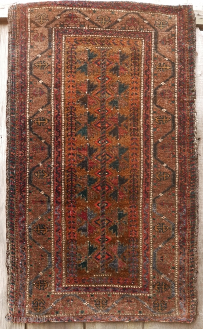 Baluch 'balisht'(complete);  circa 1900;  lustrous wool;  unusual border;  warm,   natural colors;  excellent condition,  and clean. SOLD         