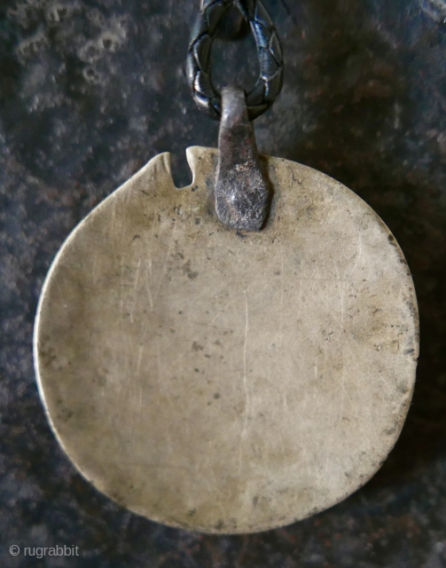 Antique Tibetan 'Melong'; brass and bronze;  18th c.

18th c  Tibetan 'Melong' with Presence and evidence of much ritual use by Bon priests and shamans.  The 'melong' is a symbolic  ...