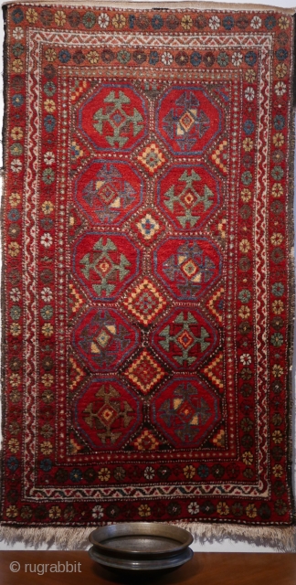 Kurdish, circa 1900,  3'3"x5'10",  brilliant saturated colors,  full and soft pile,  great handle,  pale orange abrash across the top eleven inches,  But for the rewrapping that  ...