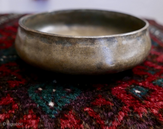 Antique Hand-hammered Hindu Brass Bowl,  N India;  19th c;  7"W x 1 3/4"H

Incredible bowl,  ritual use(?),  with a rather primitive repeated motif around the floor of the  ...