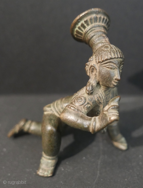 17th c  Hindu 'Balakrishna',  bronze,  4"H x 2"W. 

Museum quality but for a break in the fingers of the left hand.         