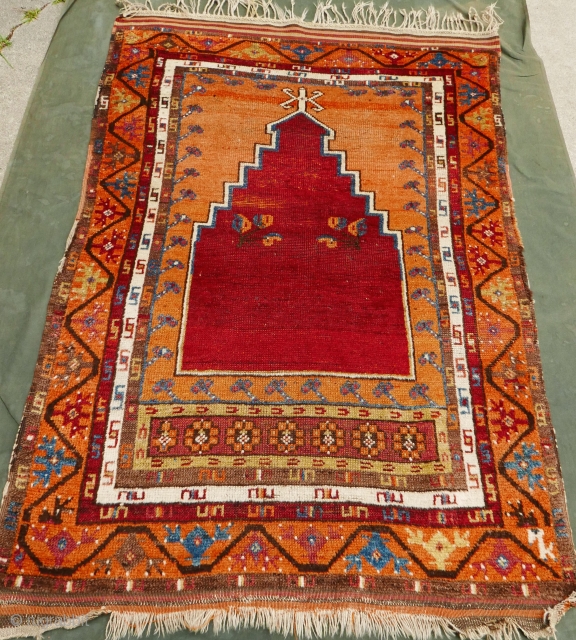 Strikingly beautiful Anatolian prayer rug,  circa 1900,  extremely floppy handle,  silken pile on much of the rug,  though mainly in the borders;  shades of copper,  rust,  ...