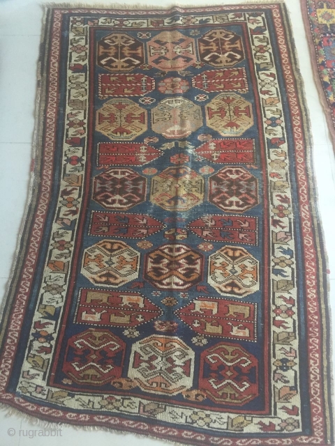 Antique caucasian kazak burst rug circa 1900, size 135x90cm.                        