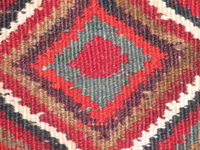 wonderful tribal kilim.veramin?cute size great condition and weving and fantastic colours and figures.it has also some glass evel-eyes for protection.please feel free to contact me.thank you       