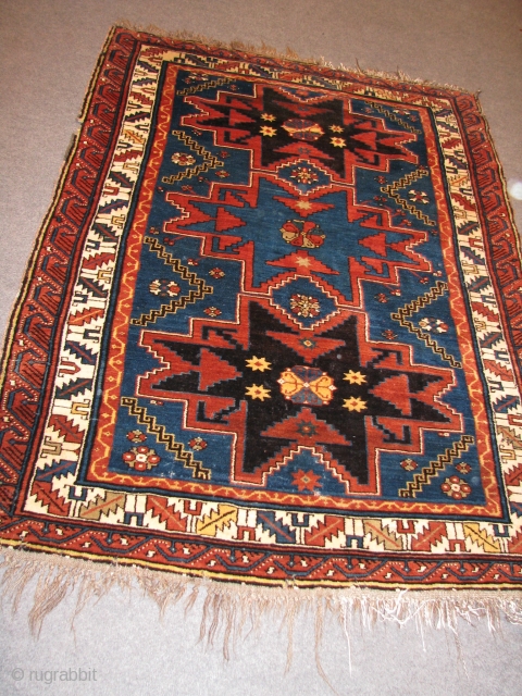 HAPPY NEW YEAR 2012!Wonderful Caucassian Rug.Lesghi?top quality wool,wonderful colours.very small damages but very easy to repair.it is in great condition for its age and the piles are high.please email me for more  ...