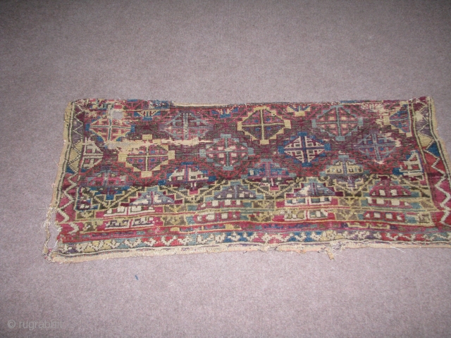 Central Anatolian?Yellow Konya,Obruk,Cappadocia?I need your helps and advice and opinions about this unusual rug dear friends,collectors,deallers,please.it is one of the most unusual piece i ever saw.the centre part has kilim weave ends  ...
