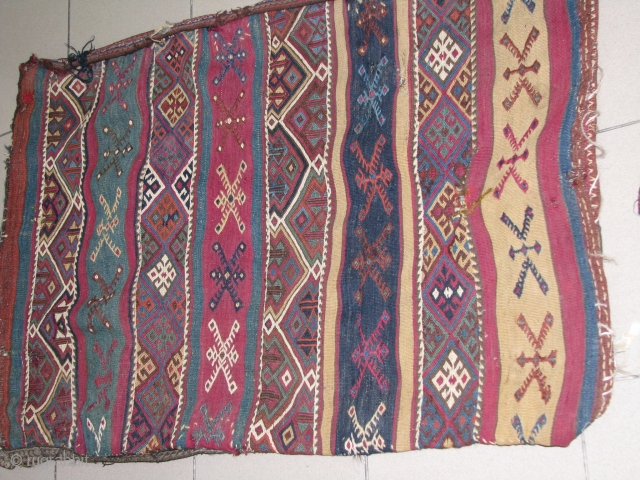 antique anatolian chuval with soumak,cecim and kilim works.with exelent colours and work.all naturel colours.117X77c.m.the back of the piece is also great and if needed i can send pictures of that part,too.feel free  ...