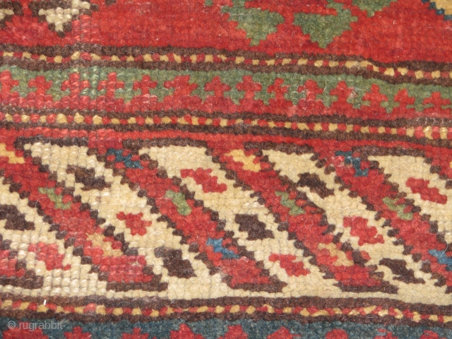 antique unusual shape rug.it is very rare piece.the base is brown and it is either brown sheep wool or camel?all naturel colours.it has nice green and other colours.it had been repaired in  ...