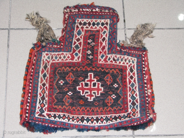 old bakhtyari salt bag .lovely piece with cross design in the centre.it is wool but the white colour is cotton.it has great colours and good condition.it is with soumack work mainly,it has  ...