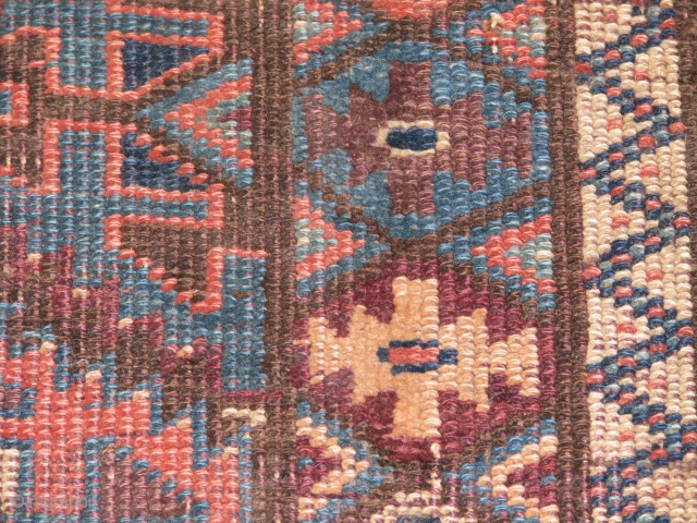 unusual antique rug fragment.it has fantastic colours.all naturel.but i dont know what this rug is.if anyone knows please tell me and teach me.i loved the colours and the figures.the piles are worn  ...