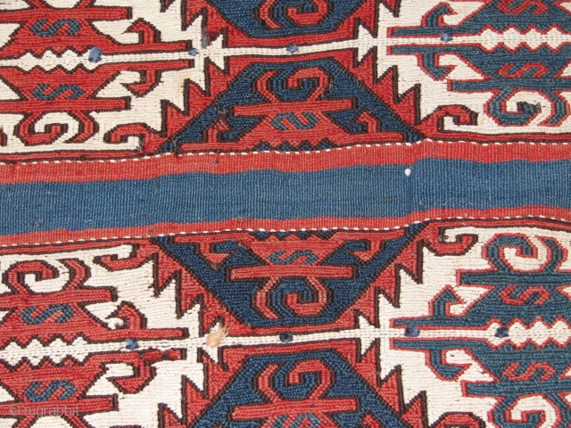 anatolian ala chuval.it has wonderfull colours.at the kilim parts it has several holes.but the soumack part is great.white colour is cotton.the work at the soumack part is high quality,colour combination is perfect  ...