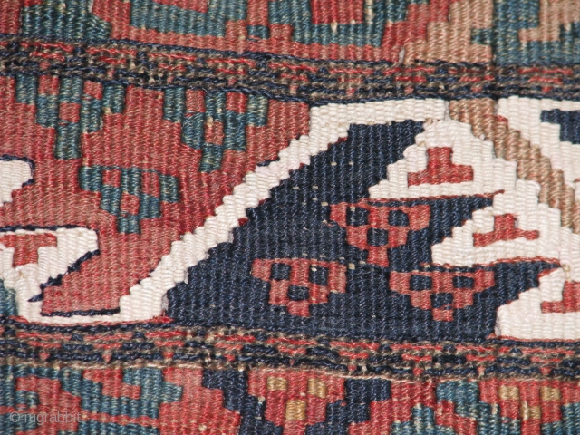 Lovely Kilim.it has great colours,very strong weave.between some panels there are also some extra soumack work.wool but the white weave is cotton.it has a bit stronger colours on the back and you  ...