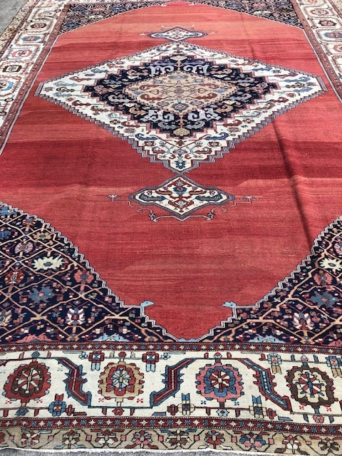 Antique Persian Bakshaish, mostly even low pile with higher pile in areas, size is a large 12,7 x 16,10 . Has a light yellow spot in border pictured and about a 5  ...