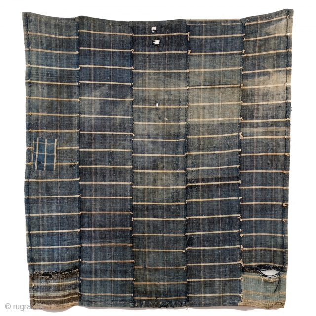 Sakiori Kotatsugake - Edo Era Indigo Rug

Indigo sakiori kotatsugake, or hearth cover. 

'Sakiori' is a woven fabric that is produced from worn out cloth and garments torn thinly and then woven tightly  ...