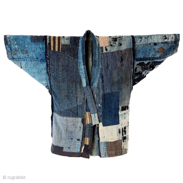 Hand sewn cotton boro﻿ 襤褸 noragi. 

Boro is a Japanese form of recycling coming from an economic necessity in which fabric is patched on the reverse side to preserve the usability.   ...