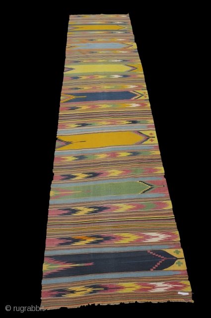Substantial half fragment of a mosque dhurrie . Early C20th
All cotton , fabulous colors . I think its from Kutch , India.
528 x 120 cm
        