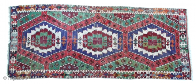 A very nice Anatolian Kilim, finely woven in excellent condition.
139" x 57"                     