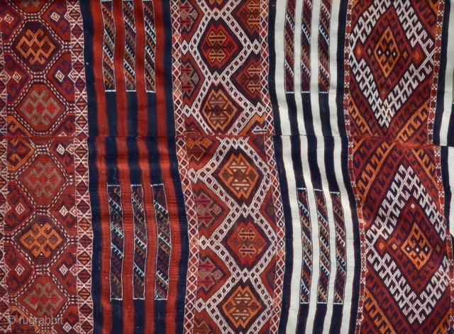 Large Kurdish kilim two panel woven with intricate Soumak weaving from SE Turkey.
130" x 67"                  