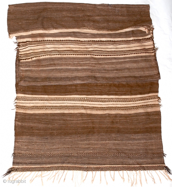 Berber Glaoua Tribal Blanket/Rug  A classic early Glaoua, used for storage of wheat, in finely woven all natural, undyed wool with geometric design form the High Atlas Mountains, Morocco.

124" x 53" 