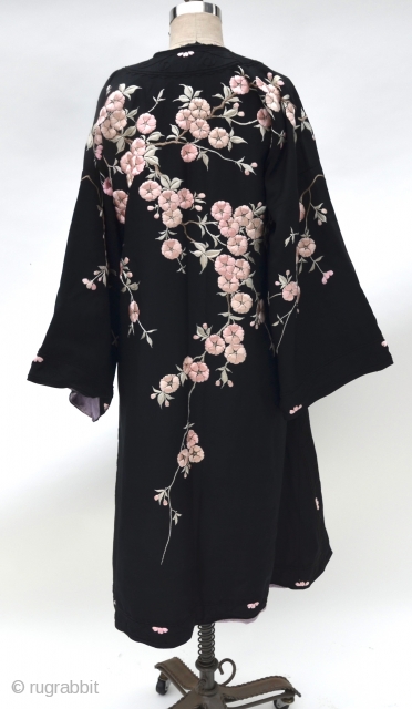 Chinese Silk Embroidered Turn of the Century Embroidered Robe
embroidered pink blossoms on black silk robe with brass frog buttons, wide cut bracelet length sleeves and side slits, made for the western market  ...