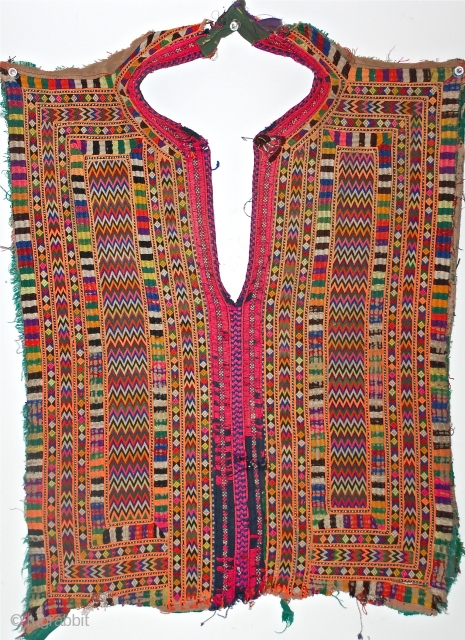 Baluchi Embroidered Dress Panel.
The embroidery of Baluchistan, Pakistan is called "doch" and is unique in its intricate repetitive geometric patterns and colors. This woman's dress yoke from Baluchistan (pashk) features a repertoire  ...