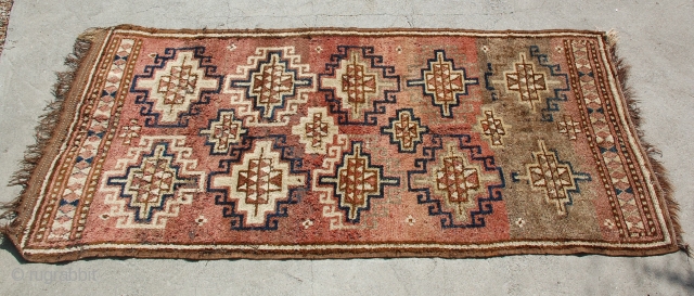 Antique Uzbek Rug, Central Asia, early 1900s. Natural dyes woven goat wool with long pile (julkhyrs), wear in some areas but lovely for the age and rarity, not distracting. 9' x 6'  ...