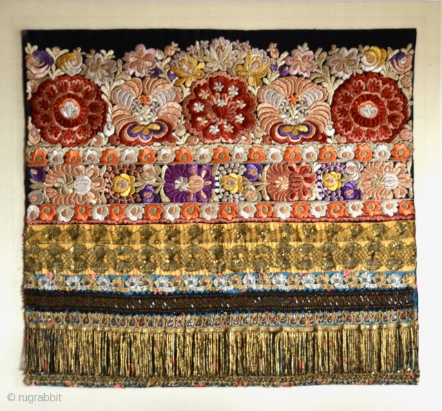 Hungarian Matyo silk hand-embroidered with gold metallic threads and beads, man's apron, part of a folk costume, early 1900s Mezokovesd, Northern Hungary. Cloth 25" x 23"
In plexi frame.     