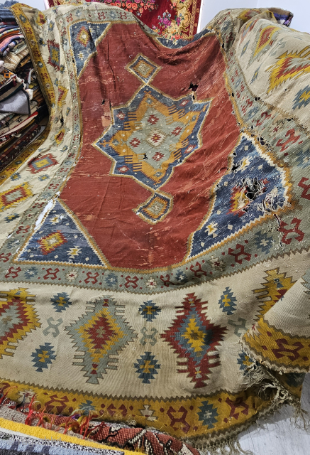 A masterpiece searching for its new throne... 
​This Balkan kilim (likely a Pirot or Chiprovtsi) once graced the floors of an 1800s mansion, witnessing centuries of history. Though it shows the graceful  ...