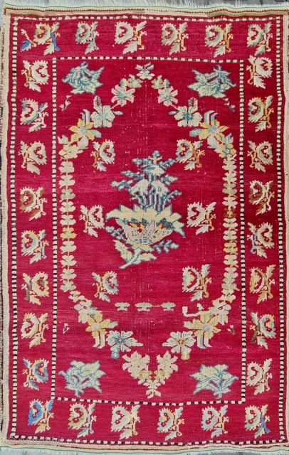 It was published as ghördes in the catalog, but I think it is a Kirsehir (mudjur) carpet.
what is your idea ?
Size; 110 x 176 cm,
        