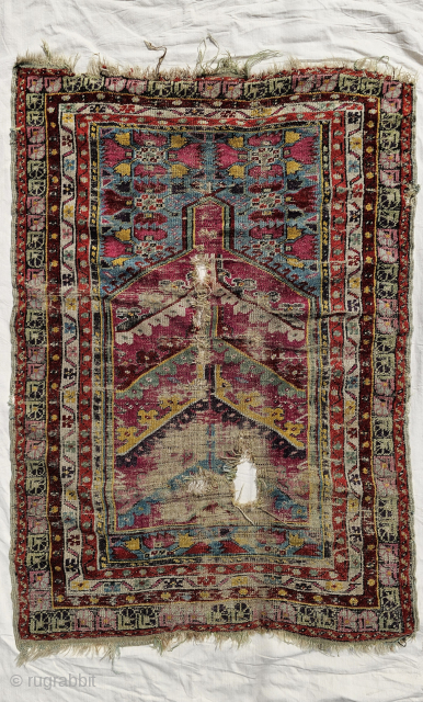 Another breathtaking Cappadocia Carpet!
​Dating back to the 1870s, this piece carries the beautiful marks of time and a life well-lived. It’s like a woven rainbow, where magnificent natural dyes come together in  ...