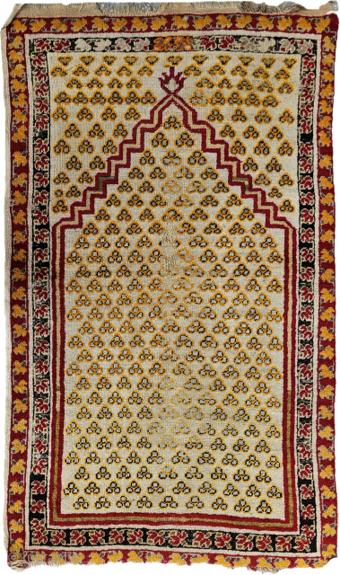 Echoes of the Sultans: A 19th-Century Homage
​Born in the waning years of the 1800s, this Anatolian rug—likely woven in the storied looms of Mucur or Ghiordes—is not merely a floor covering; it  ...